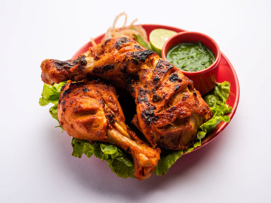 Juicy Chicken Tikka grilled with aromatic spices – food delivery Karachi