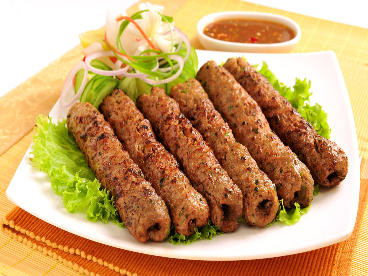 Delicious Beef Seekh Kebab served with fresh naan – home food delivery Karach