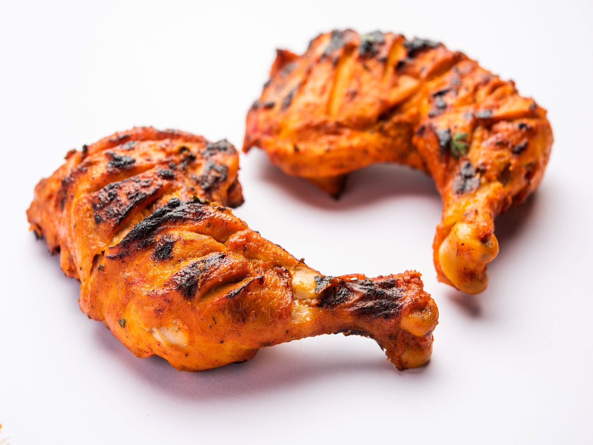 Delicious Chicken Tikka served with naan – home food delivery Karachi