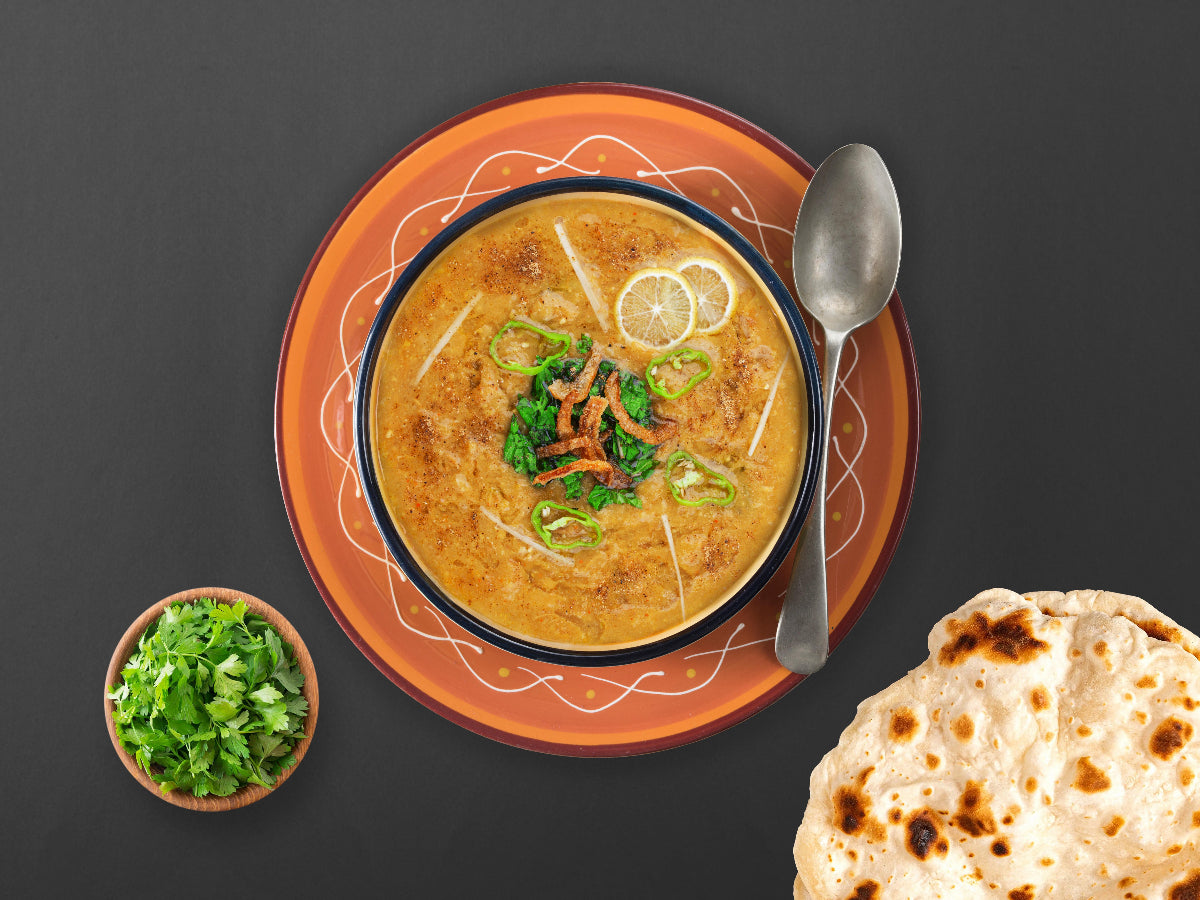 Creamy Chicken Haleem served with naan – delivered fresh to your door in Karachi